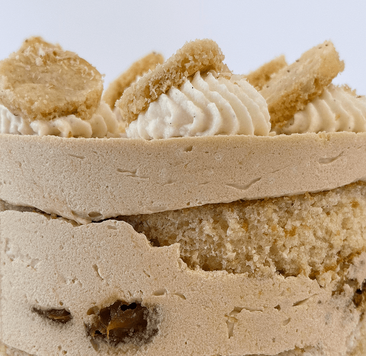Layers alfajores cake with buttercream and cookie decoration