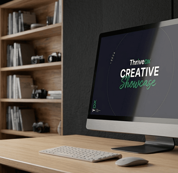 ThriveDX Creative Showcase on a desktop monitor